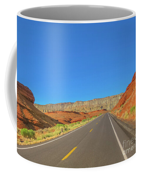 Bighorn Lake Coffee Mug featuring the photograph Highway in Bighorn Canyon #1 by Benny Marty