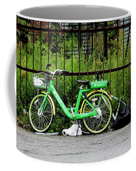 Electric-assist Bicycle Coffee Mug featuring the photograph A Welcome Splash of Lime on a Wet and Windy Day by Steve Ember