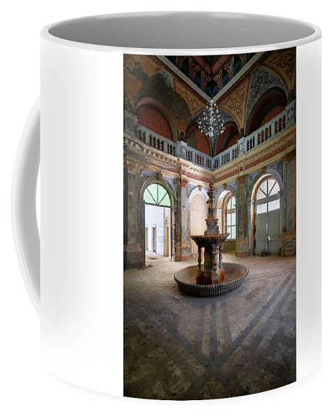 Urban Coffee Mug featuring the photograph Abandoned Fountain in Hall by Roman Robroek