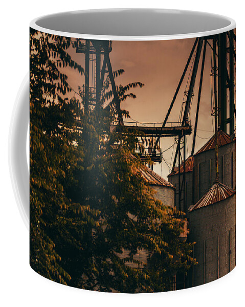 https://render.fineartamerica.com/images/rendered/default/frontright/mug/images/artworkimages/medium/2/abandoned-silo-at-sunset-victor-vera.jpg?&targetx=149&targety=-2&imagewidth=499&imageheight=333&modelwidth=800&modelheight=333&backgroundcolor=A06E51&orientation=0&producttype=coffeemug-11