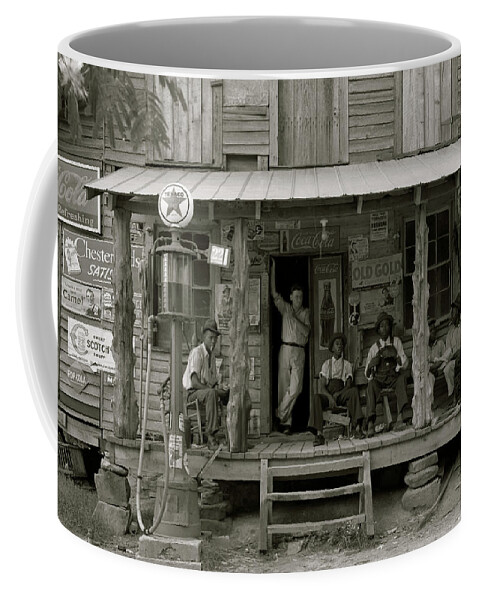 African Coffee Mug featuring the painting African American and a white store owner on the Porch of a country store by 
