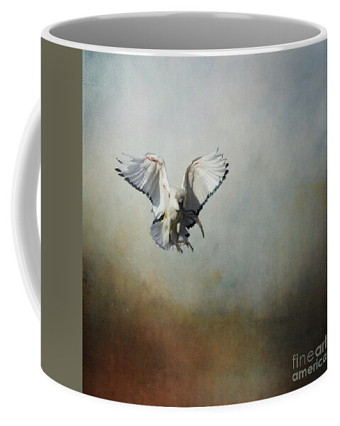 African Sacred Ibis Coffee Mug featuring the photograph African Sacred Ibis in Flight by Eva Lechner