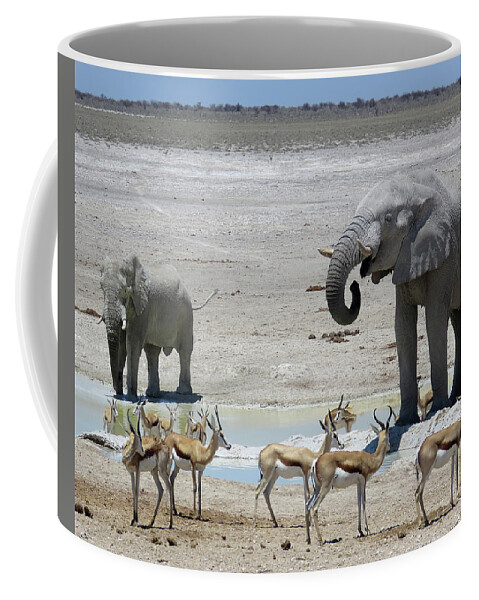 Africa Coffee Mug featuring the photograph At the water Hole ... by Eric Pengelly