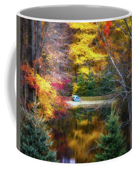 Colors Coffee Mug featuring the photograph Autumn Pond with Rowboat by Tom Mc Nemar