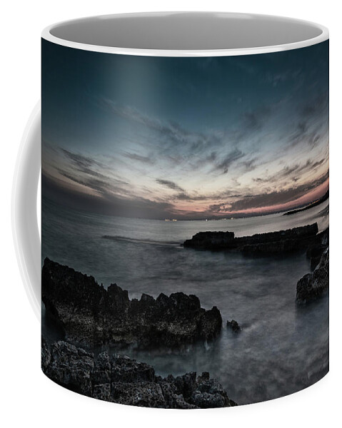 Seascape Coffee Mug featuring the photograph Beautiful dramatic Sunset on a rocky coastline by Michalakis Ppalis