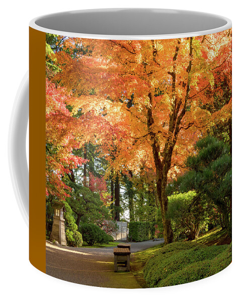 Garden Coffee Mug featuring the photograph Bench in Japanese Garden by Jean Noren