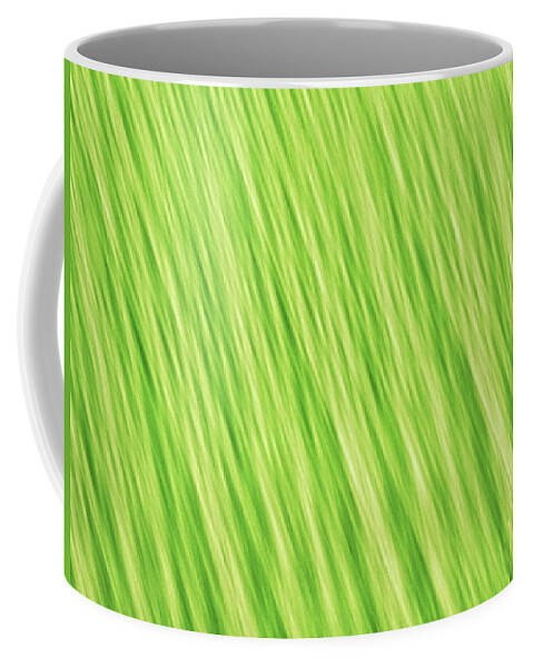 Abstract Coffee Mug featuring the photograph Bright chartreuse green blurred diagonal lines abstract by Teri Virbickis