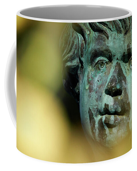 Cherub Coffee Mug featuring the photograph Bronze cherub Statue at Apodaca Mall by Pablo Avanzini