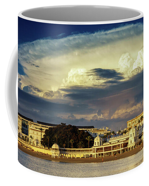 Famous Coffee Mug featuring the photograph Cloudy Sky over La Caleta Spa Cadiz by Pablo Avanzini
