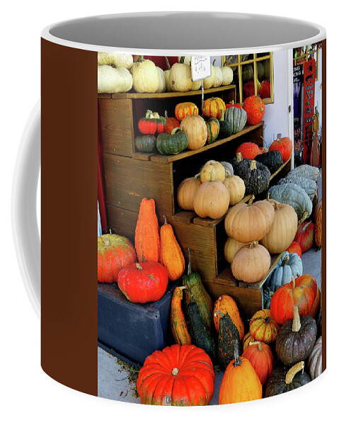 Farmer's Market Display Coffee Mug featuring the photograph Colorful Gourds and Squash on Display by Linda Stern
