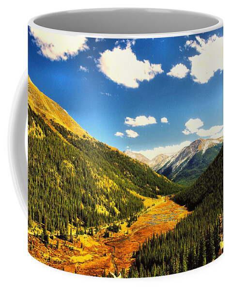 Mountains Coffee Mug featuring the photograph Deep in a Colorado valley by Jeff Swan
