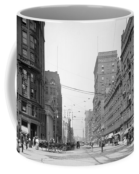1905 Coffee Mug featuring the photograph DOWNTOWN CLEVELAND, c1905 by Granger