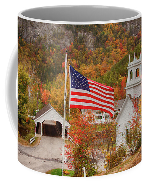 Autumn Coffee Mug featuring the photograph Flag flying over the Stark covered Bridge by Jeff Folger