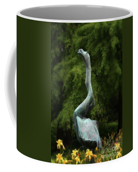 Planten Un Blomen Coffee Mug featuring the photograph Flamingo with Daylilies by Yvonne Johnstone