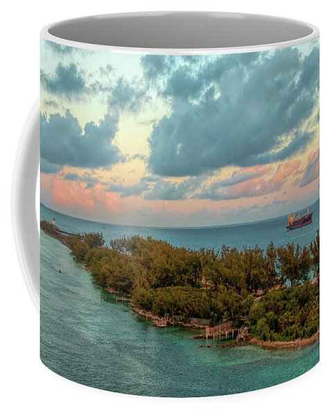 Lighthouse Coffee Mug featuring the photograph Freighter Off Paradise Island by Kristia Adams