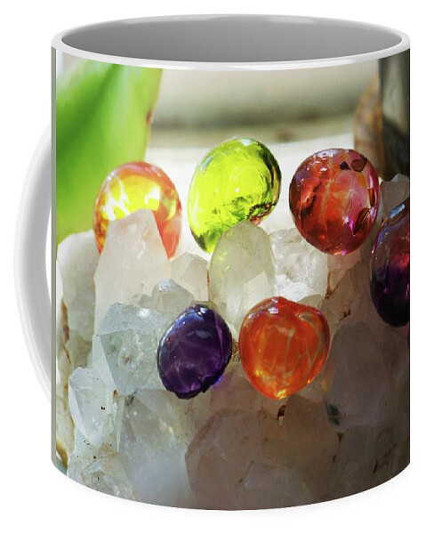 Glass Coffee Mug featuring the photograph Glowing Orbs by Julie Rauscher