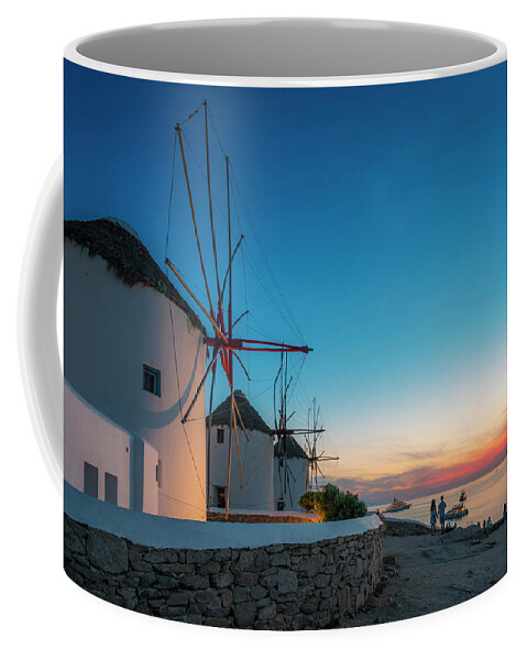 Estock Coffee Mug featuring the digital art Greece, Aegean Islands, Cyclades, Mediterranean Sea, Aegean Sea, Greek Islands, Mikonos Island, Mykonos, Windmills At Sunset by Giorgio Filippini