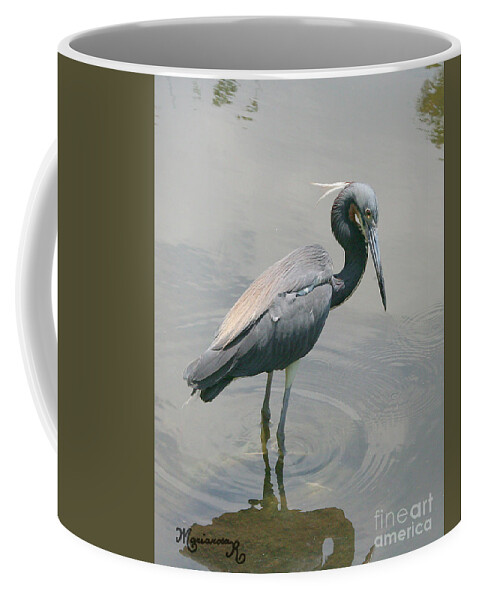 Fauna Coffee Mug featuring the photograph Heron posing by Mariarosa Rockefeller