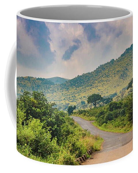 Safari Coffee Mug featuring the photograph Hluhluwe Misty Morning by Marcy Wielfaert