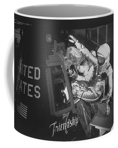 Astronaut Coffee Mug featuring the photograph John Glenn Entering Friendship 7 - 1962 by War Is Hell Store