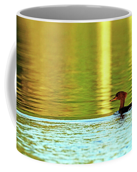 Merganser Coffee Mug featuring the photograph Merganser In The Setting Sun by Debbie Oppermann