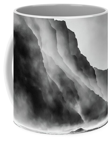 Cliff Coffee Mug featuring the photograph Mist on the rocks by Lyl Dil Creations