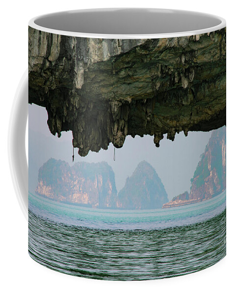 Bai Tu Long Bay Coffee Mug featuring the photograph Natural Arch Near Vung Vieng Fishing Village Three by Bob Phillips