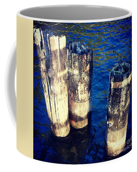 Wooden Coffee Mug featuring the photograph Posts in Water by Suzanne Lorenz