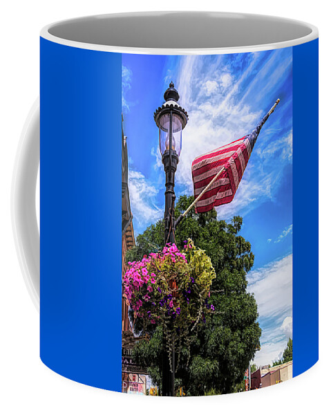 American Coffee Mug featuring the photograph Pretty All American Lamp Post Flowers and Flag by Debra Martz