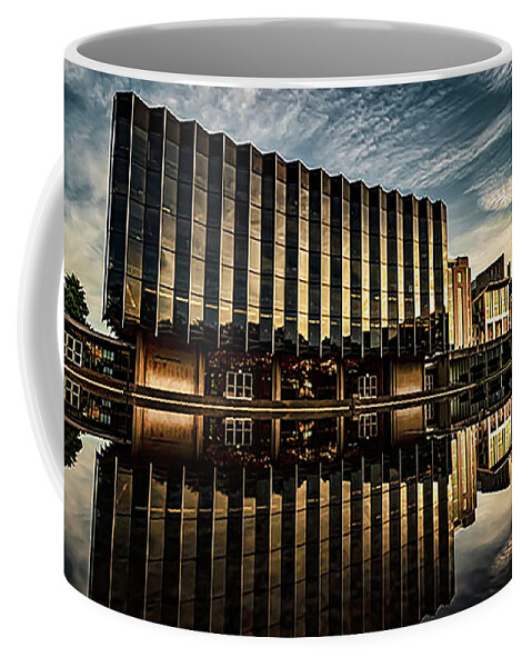 Building Coffee Mug featuring the photograph Pretty building with reflection pool near sunset by Sven Brogren
