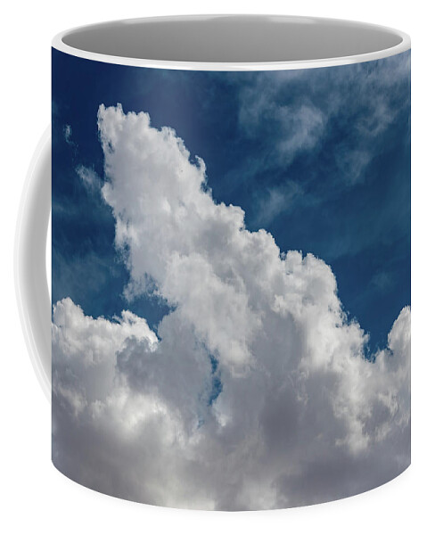 White Coffee Mug featuring the photograph Puffy White Clouds by Douglas Killourie