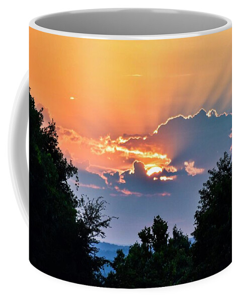 Photograph Coffee Mug featuring the photograph Rising Sun by Kelly Thackeray