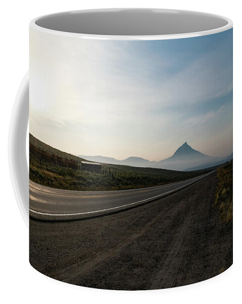 Rural Coffee Mug featuring the photograph Road through the Rockies by Nicole Lloyd