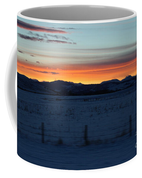 The Cowboy Trail Coffee Mug featuring the photograph Rocky Mountain Sunset by Ann E Robson