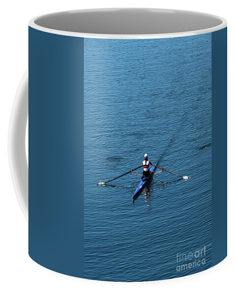 Rowing Coffee Mug featuring the photograph Single Female Rower In Racing Boat by Andreas Berthold