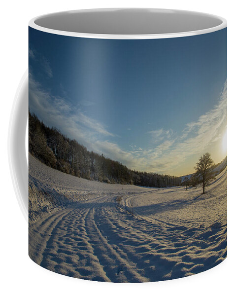 Sunset Coffee Mug featuring the photograph Snow and Sunset by Mark Hunter
