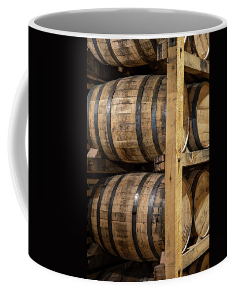 Tennessee Whiskey Trail Coffee Mug featuring the photograph Stack of whisky in oak barrels by Karen Foley
