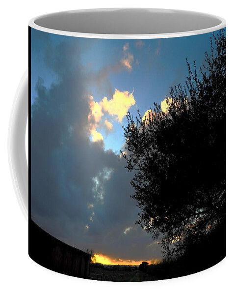Weather Coffee Mug featuring the photograph Stormy Sundown by Richard Thomas