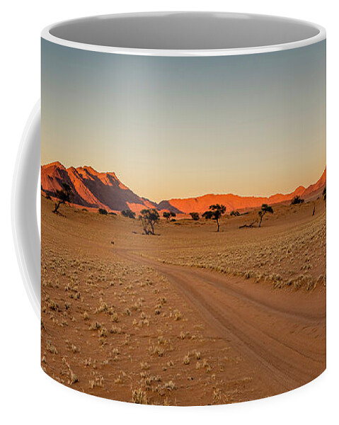 Sunrise Coffee Mug featuring the photograph Sunrise desert Namibia by Marcel Bettonville