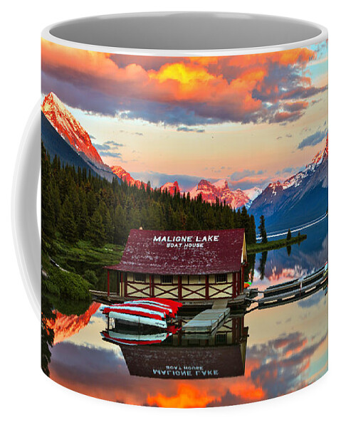 Maligne Lake Coffee Mug featuring the photograph Sunset Glow Over The Maligne Lake Boathouse by Adam Jewell