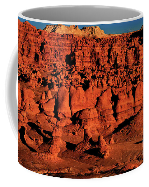 North America Coffee Mug featuring the photograph Sunset Light Turns The Hoodoos Blood Red In Goblin Valley State Park Utah by Dave Welling