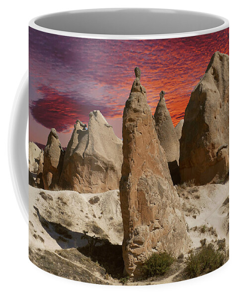 Volcanic Coffee Mug featuring the photograph Sunset on fairy chimney balanced rock by Steve Estvanik