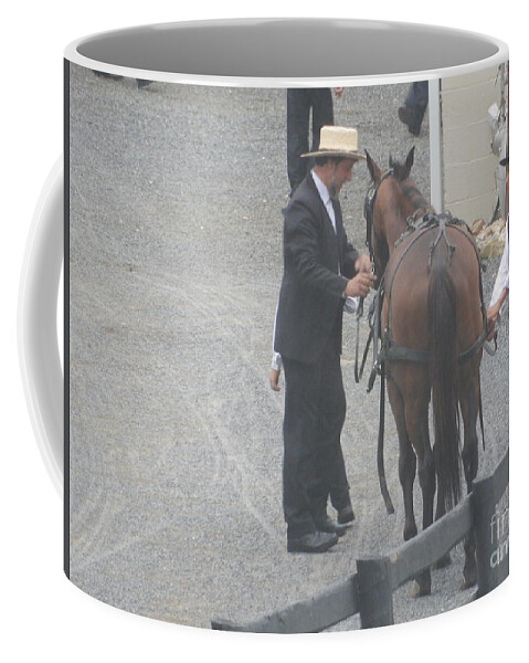 Amish Coffee Mug featuring the photograph Tending to a Horse by Christine Clark
