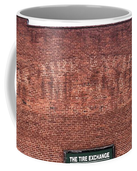 Tire Coffee Mug featuring the photograph The Tire Exchange by Flavia Westerwelle
