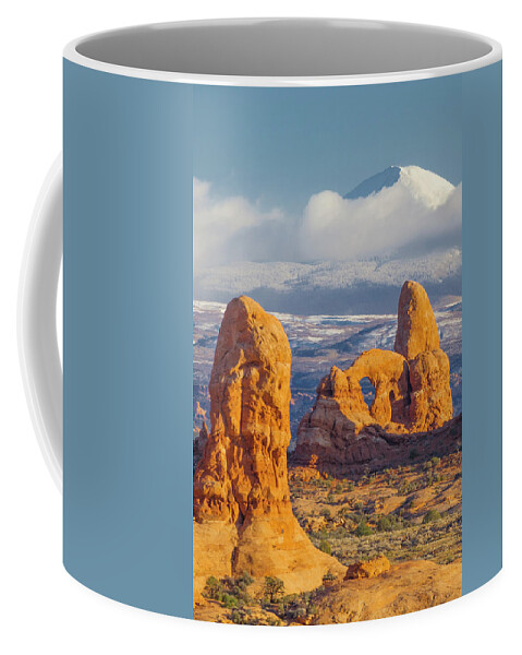 Jeff Foott Coffee Mug featuring the photograph Turret Arch In Winter by Jeff Foott