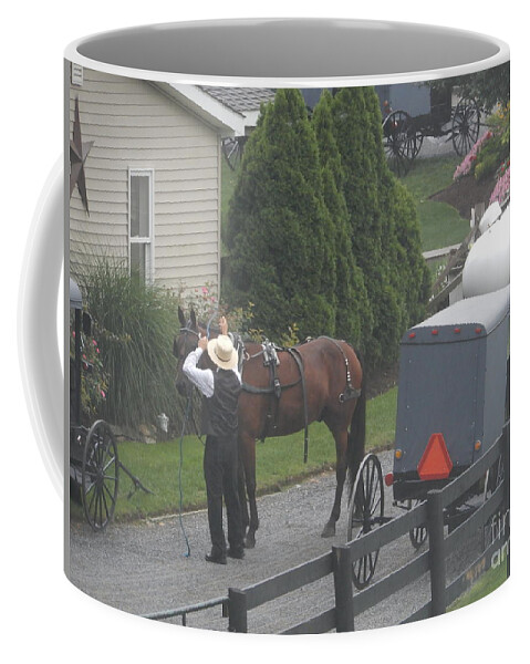 Amish Coffee Mug featuring the photograph Unhitching the Horse on a Sunday by Christine Clark