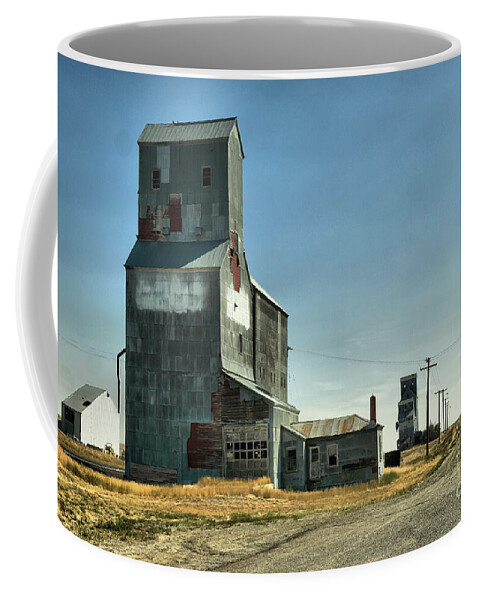 Silo Coffee Mug featuring the photograph Where things move slow by Jeff Swan