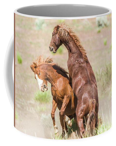 Nevada Coffee Mug featuring the photograph Wild Horse Fight III by Marc Crumpler