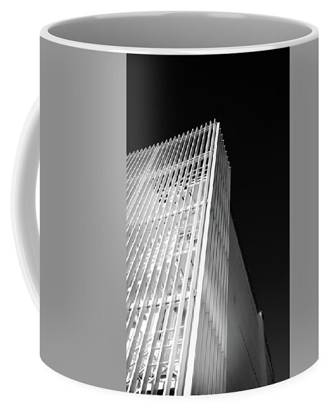 Architecture Coffee Mug featuring the photograph Abstract architecture design. Black and white futuristic exterior background. Black sky copy-space by Michalakis Ppalis