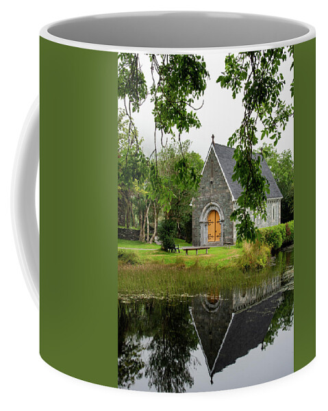 County Cork Coffee Mug featuring the photograph Catholic church of  Saint. Finbarr Oratory. Gougane Barra park by Michalakis Ppalis